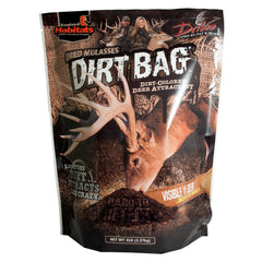Evolved Habitats DirtBag dirt-colored deer attractant blending with ground to draw deer