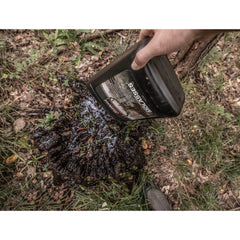 Evolved Habitats Premium Wildlife Molasses poured over decaying stumps invites foraging