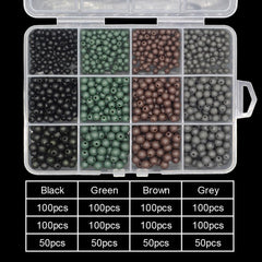Close-up of dark color carp beads showing 4mm, 5mm, and 6mm sizes