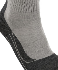 Falke TK2 Explore left-foot sock displays left-right anatomically tailored fit.