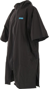 FCS Shelter all-weather poncho worn outdoors for rain protection