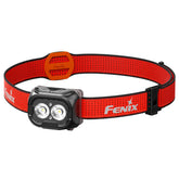 Fenix HL18R-T headlamp front view showing bright white beam for trail visibility