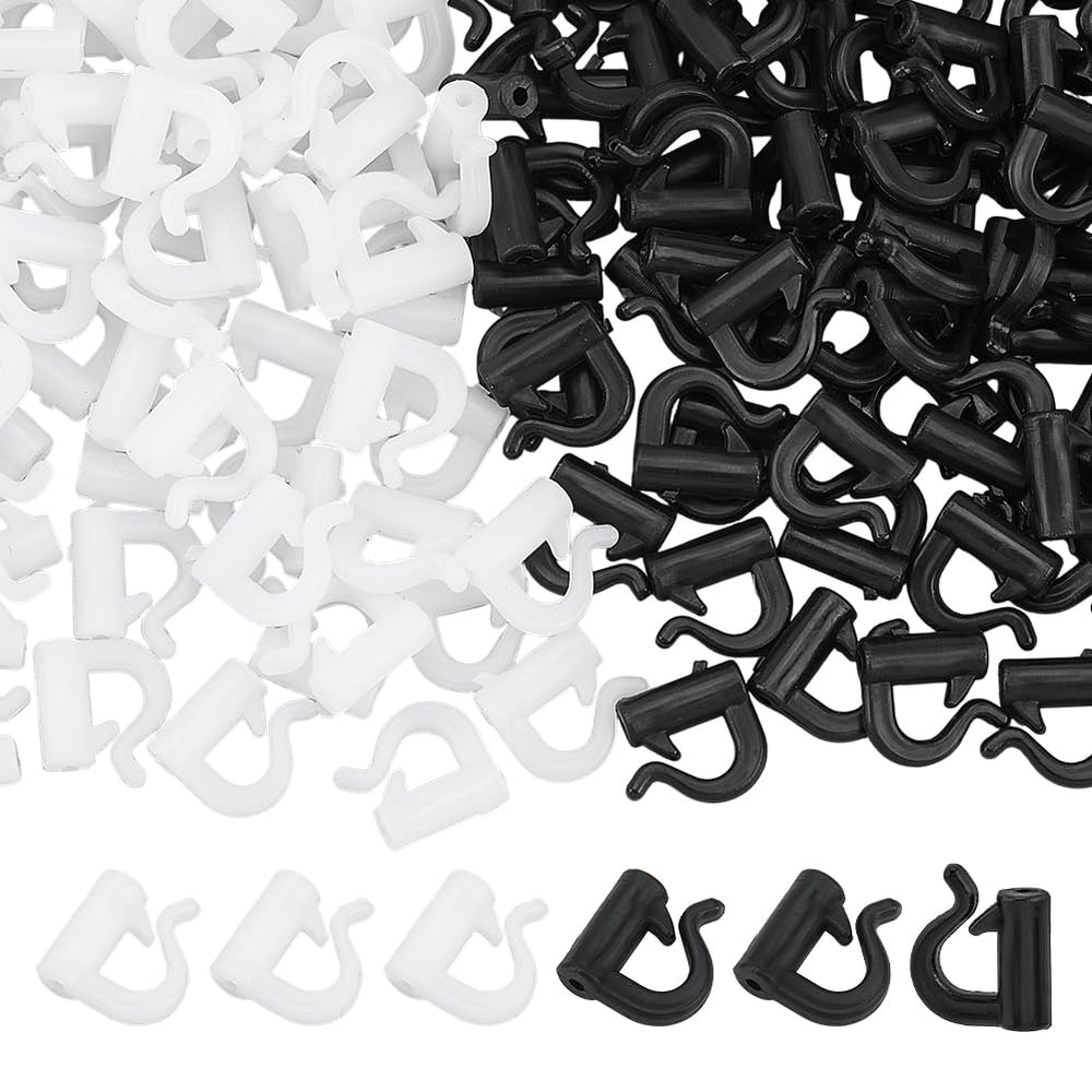 FINGERINSPIRE quick-change spinner clevis in black and white for rapid rigging.