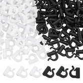 FINGERINSPIRE quick-change spinner clevis in black and white for rapid rigging.