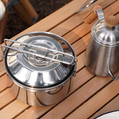 Fire-Maple Antarcti locking-lid on a boiling pot for secure outdoor meals.