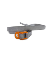 First Lite ash grey 40-inch accessory strap for secure packing.