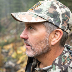 First Lite Lo-Pro Hat Typha camo, ready for hunting or fishing trips in any season.