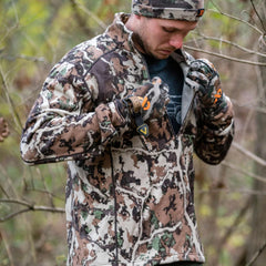 First Lite Merino-X EXP fabric texture detail highlighting breathable warmth.