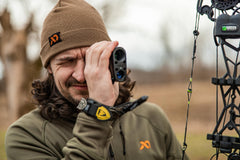 First Lite Tag Cuff Merino Beanie, rolled-down cuff, secure fit for active hunts.