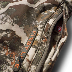 First Lite Thermic Muff interior sherpa lining, soft warmth for long hunts.