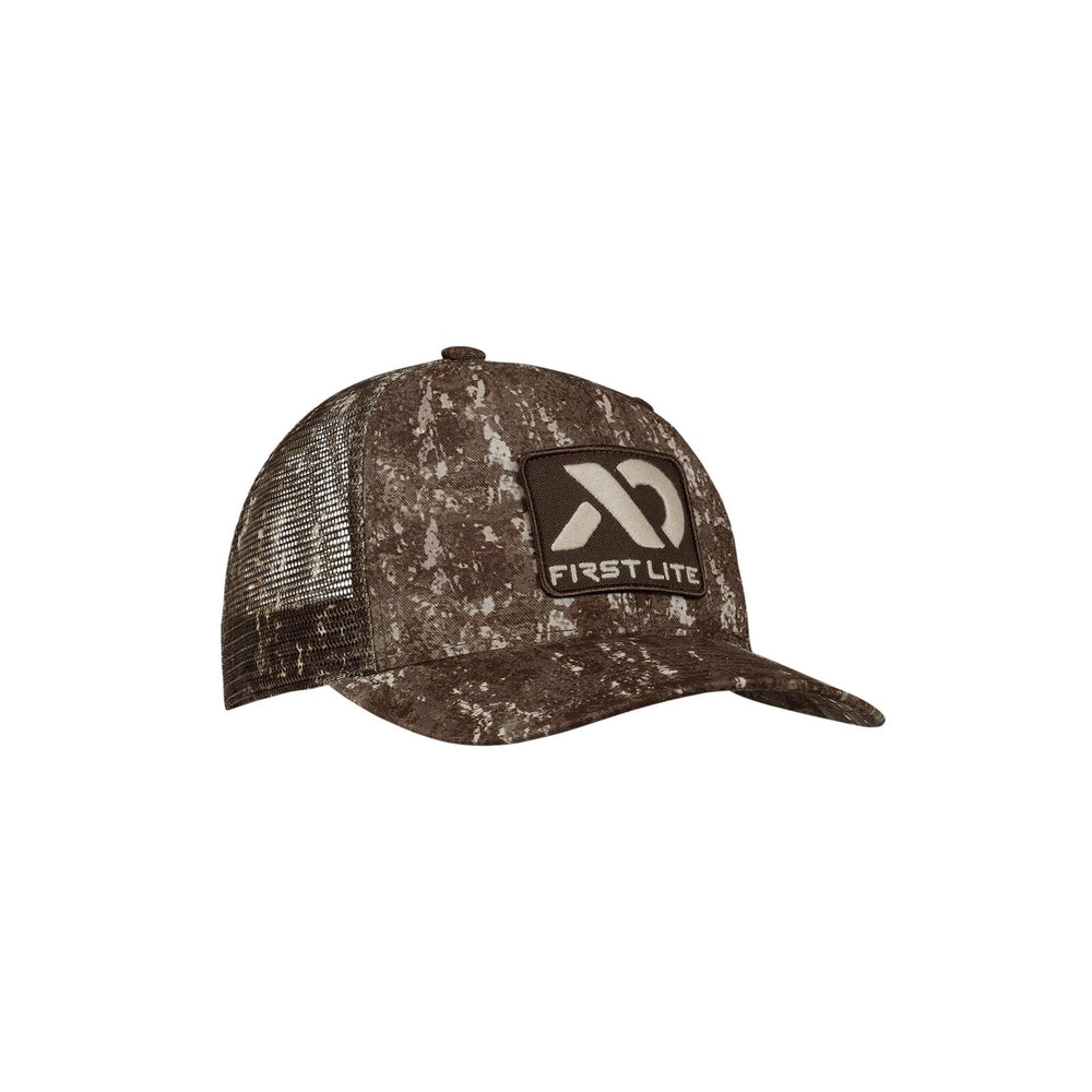 First Lite Trucker Hat Darkwater front view with sun shading for outdoor days