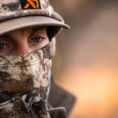 First Lite Aerowool neck gaiter conifer close-up fabric texture for quick-drying, cooling performance.