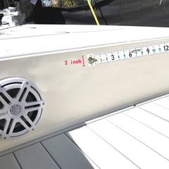 Close-up of matte top layer with oversized numbers on fish ruler sticker