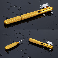 Close-up of gold hook tie device