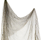 Repurposed 5x10 ft fishing net draped on wall for nautical decor