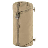 Fjällräven Singi Side Pocket in clay attached to a backpack for extra storage during hikes