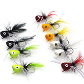 White popper fly with rubber legs topwater lure