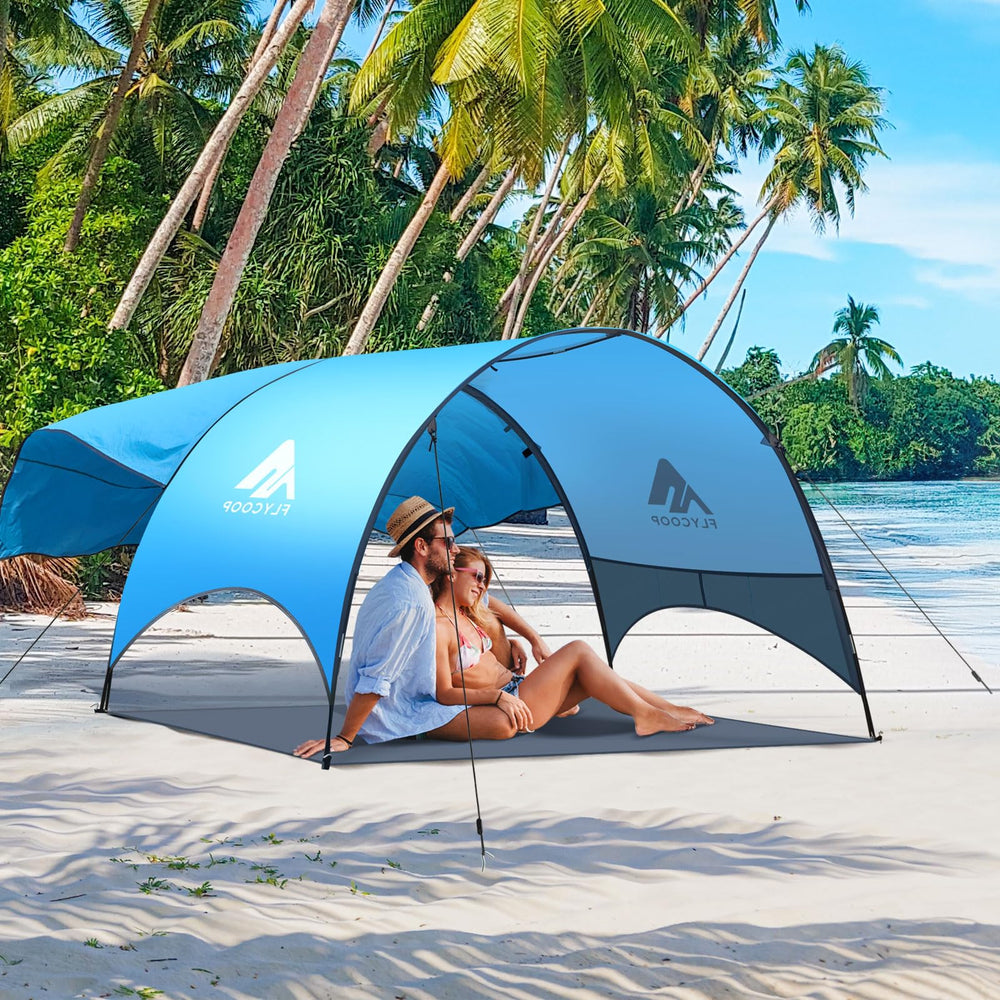 Flycoop Beach Tent compact fold offers ultra-portable shade for travel days.