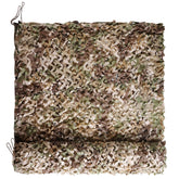 FLYEGO camo netting outer edges with paracord for quick secure attachment and shade.