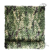 FLYEGO woodland camo netting showing sturdy paracord-edged construction for quick concealment.