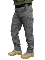 FLYFIREFLY pants water-resistant fabric demo shows rain protection during outdoor tasks.