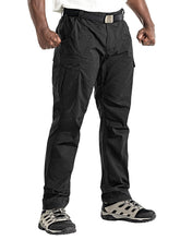 Flyplus men's tactical pants with waterproof ripstop, suited for hiking in light rain.