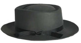 Foggy Mountain authentic rolled wool Maine Crusher Hat slate gray worn outdoors for rugged weather protection.