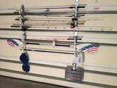 Fourth Wall Solutions garage door storage rack mounted on a garage door