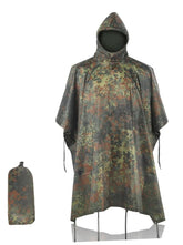 Fousam Camo Rain Poncho worn by hunter demonstrating rain protection