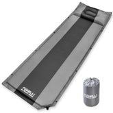 Foxelli self-inflating sleeping pad unrolled with rapid rise foam for easy setup.
