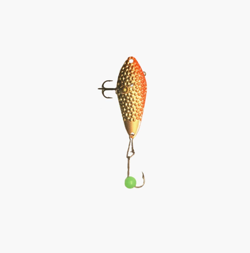 Freedom Tackle Hammered Minnow lure with orange-gold glow boosts visibility during jigging