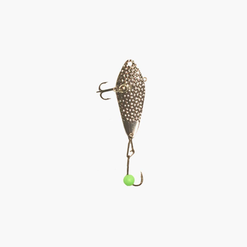 Freedom Tackle Hammered Minnow with silver finish flashes as it falls, catching attention.
