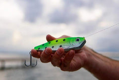 Freedom Tackle Herring Cutbait lure, side view, UV coating and glow paint for varied conditions.