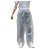 Gaexia rain pants over pants full product view in clear color, lightweight and windproof