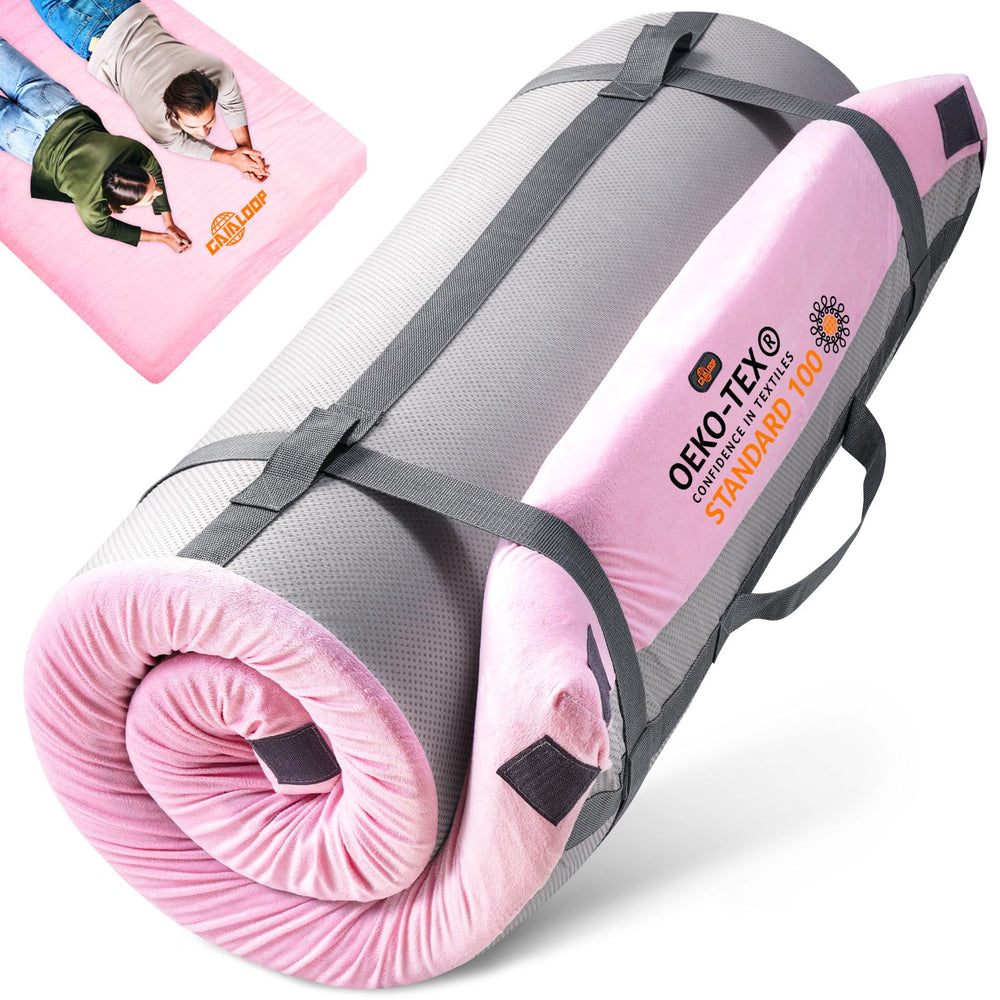 Gaialoop memory foam camping mattress rolled up, portable for car trips.