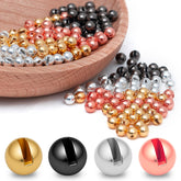 Gainfite tungsten beads 2.8mm gold close-up for fast sinking in nymph patterns.