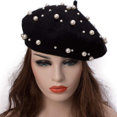Galsawi pearl-beaded wool cap close-up shows knit texture and elegance.