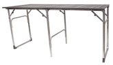 GCI Outdoor Slim-Fold Table opened for outdoor dining with seating for four.