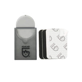 GEAR AID Tenacious Tape Mini Patches patching a down jacket tear for quick on-the-go repairs