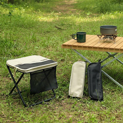 Generic camping stool in khaki highlights a durable metal frame for outdoor use.