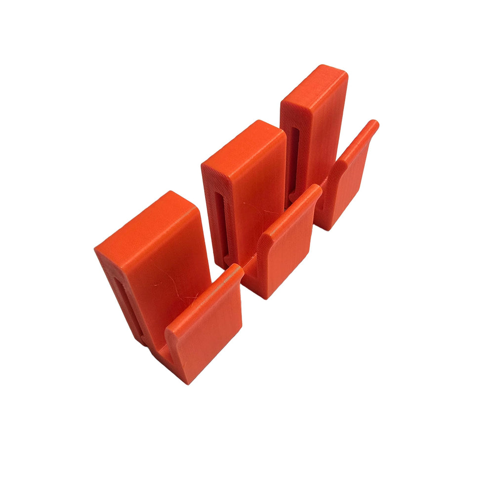 Generic Saddle Molle Clip Orange for secure gear clips during saddle hunts.