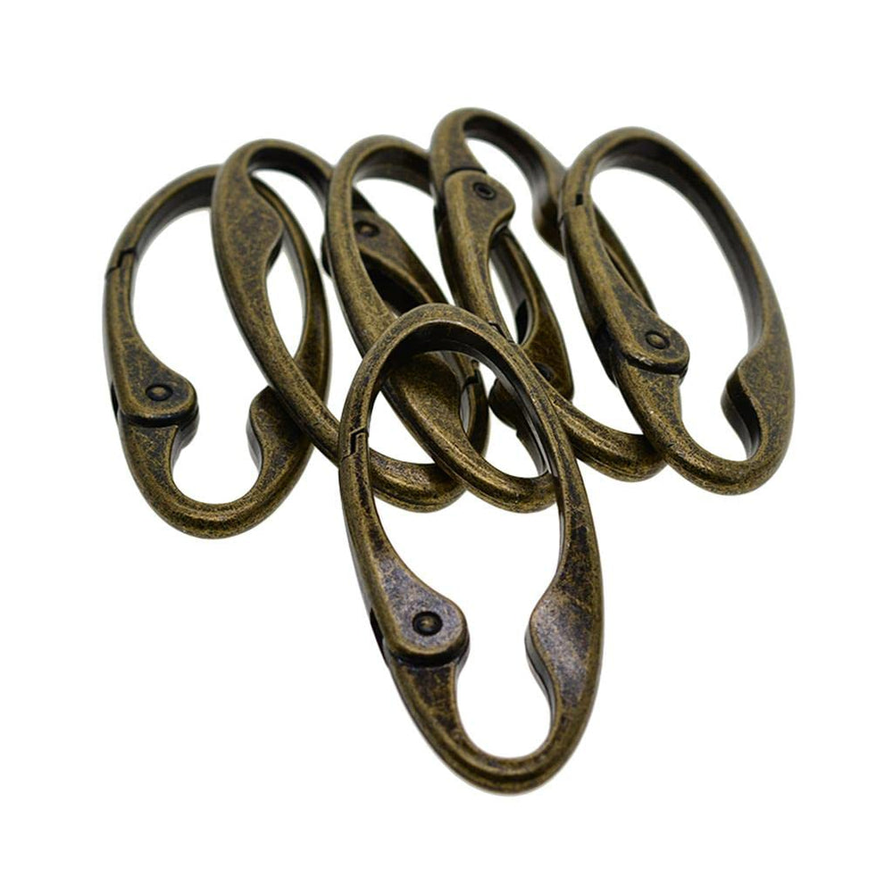 Generic vintage bronze oval carabiner close-up, sturdy clip for reliable key organization.