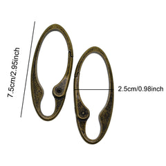 Generic vintage bronze oval carabiner in hanging crafts display.