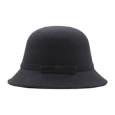 Generic women's vintage bowler hat with flower detail in black for refined winter warmth.
