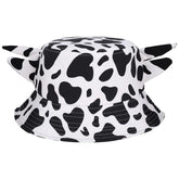 GGSTDDUP cow print bucket hat front view black and white reversible