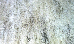 Ghillie Suits Blanket concealing two hunters in a ground blind.
