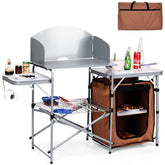 Giantex folding grill table 26-inch top provides a sturdy surface for campsite cooking.