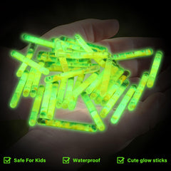 Glow sticks attached to fishing rod tip