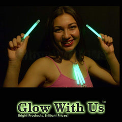 Glow With Us green glow stick closeup shows bright glow for night events.