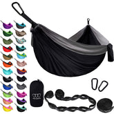 Gold Armour camping hammock in folded-stuff-sack offers portable setup for quick outdoor lounging.